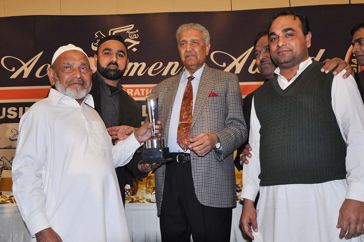 Receiving Excellence Award from Minister Petroleum