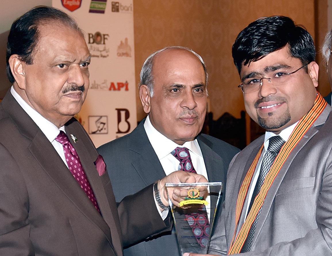 A Gold Medal from President of Pakistan H.E. Mamnoon Hussain at Aiwan E Sadar Islamabad